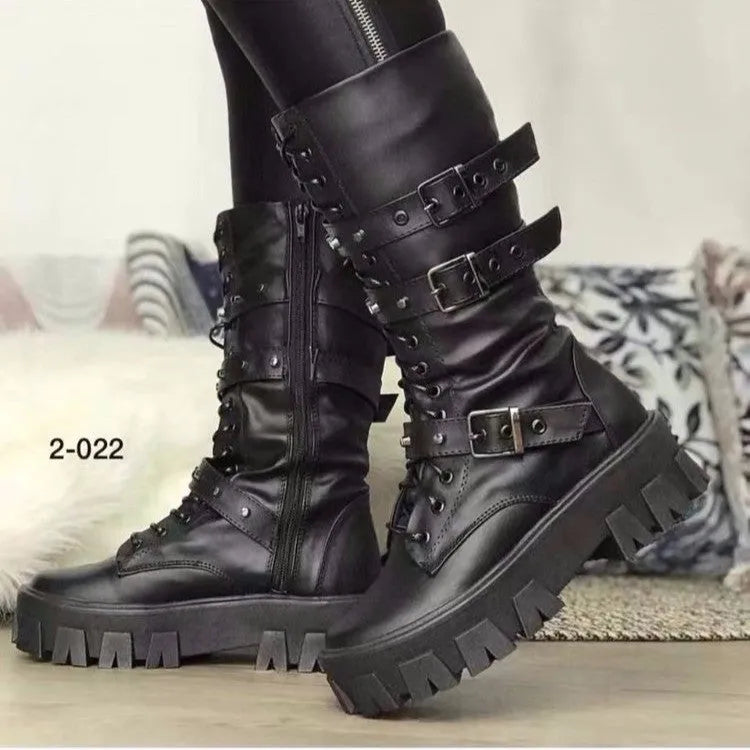 Women's black mid-calf knight boots with metal buckle and side zipper on a round toe.