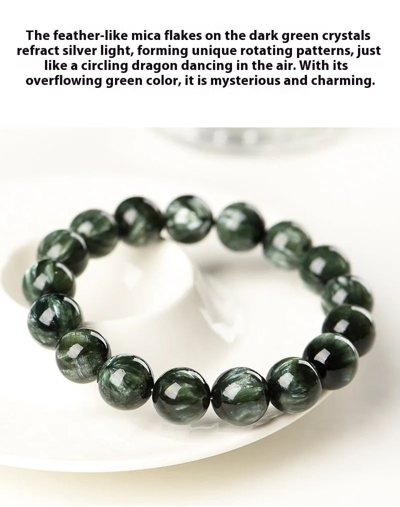 Green dragon crystal bracelet with geometric round beads showing ruyi symbolism detail
