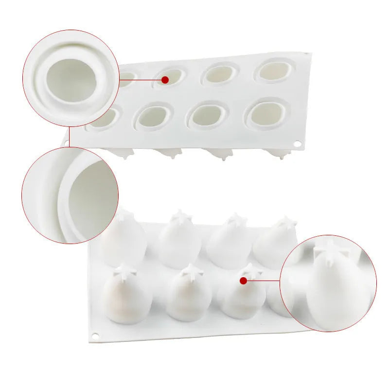 Flexible silicone baking mould with six cavities shaped like pineapple, pine cone, and pear fruit.