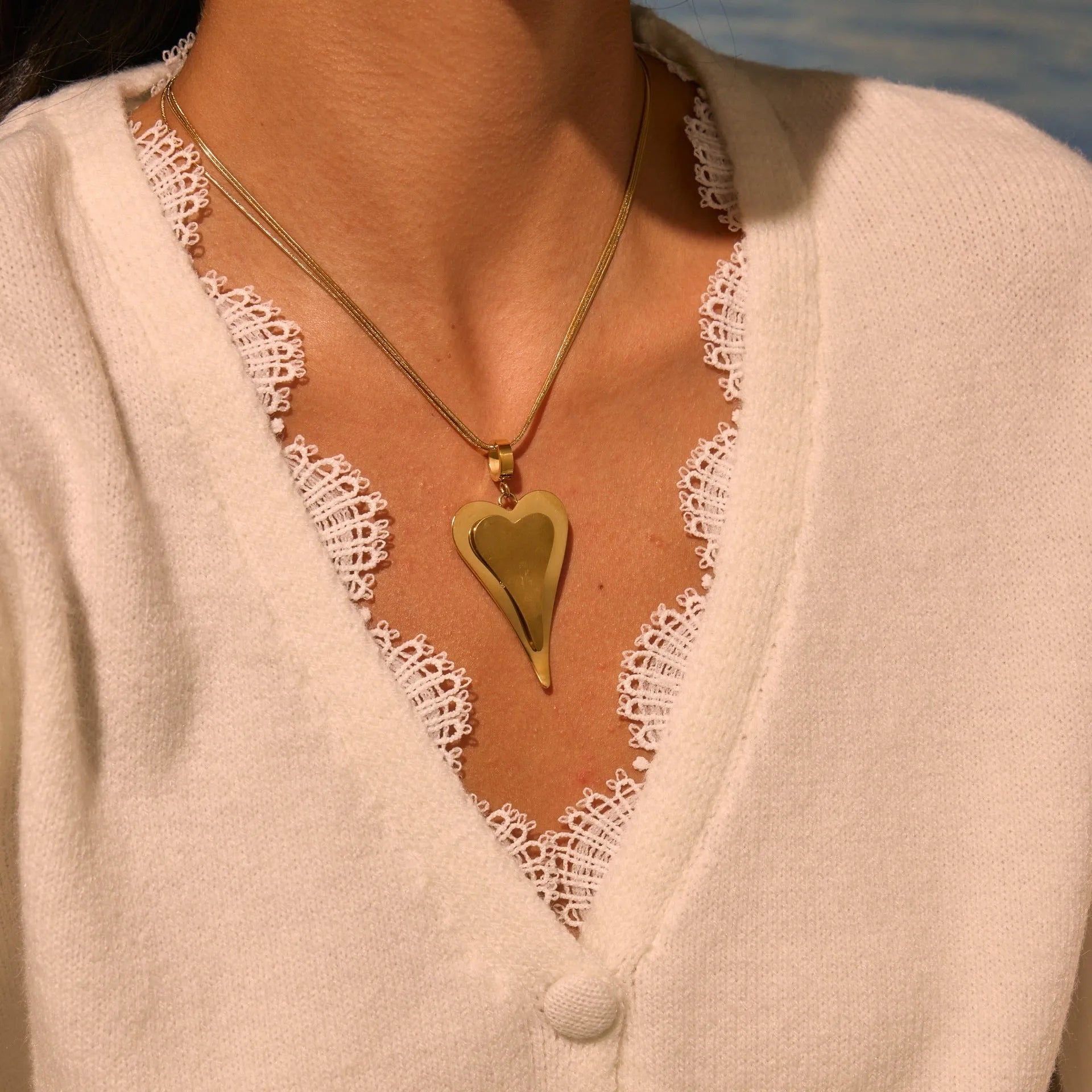 Double heart snake bones geometric necklace in gold and steel stainless steel finishes