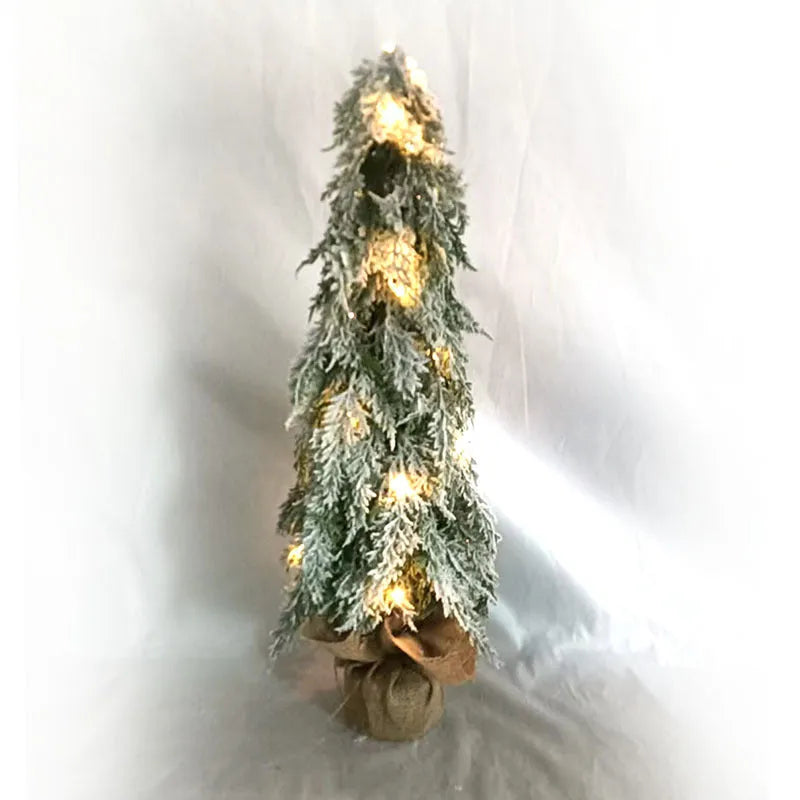 24 inch artificial Christmas tree sprayer with lights on desktop