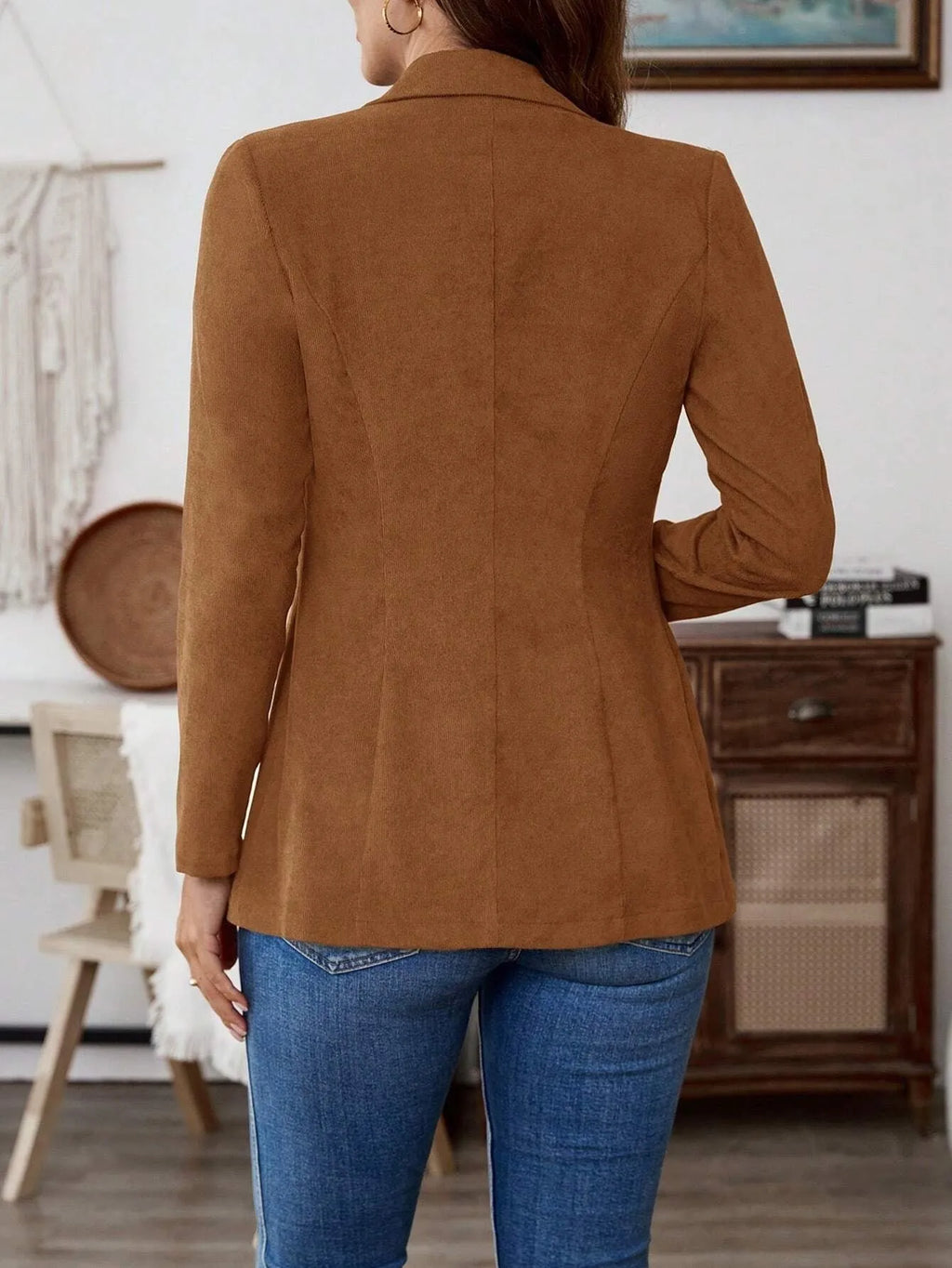 Brown men's lapel long sleeve single-breasted leisure suit coat hanging