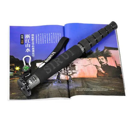 Black carbon fibre SLR camera monopod extended to 1540mm height