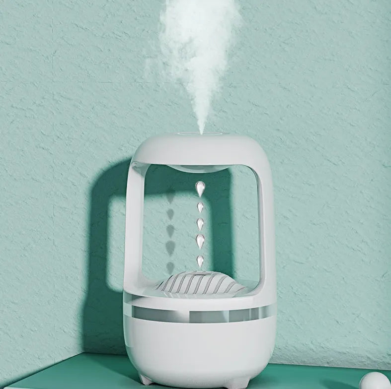 Black and white anti-gravity humidifier with floating water drops and large 500ml water tank.