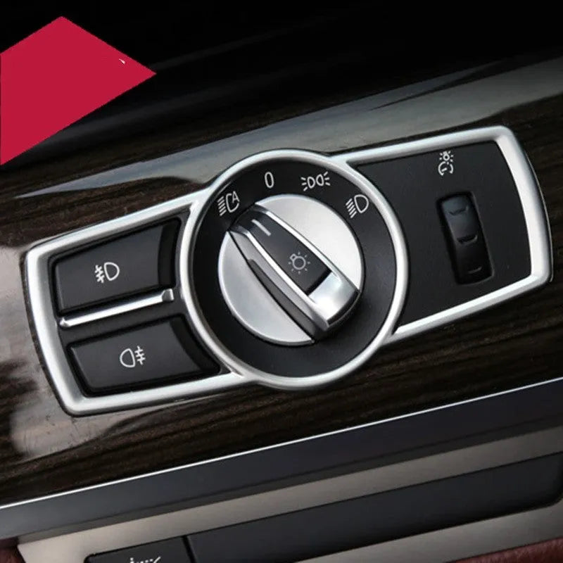 Silver ABS plastic decorative sticker for BMW headlight switch frame on dashboard