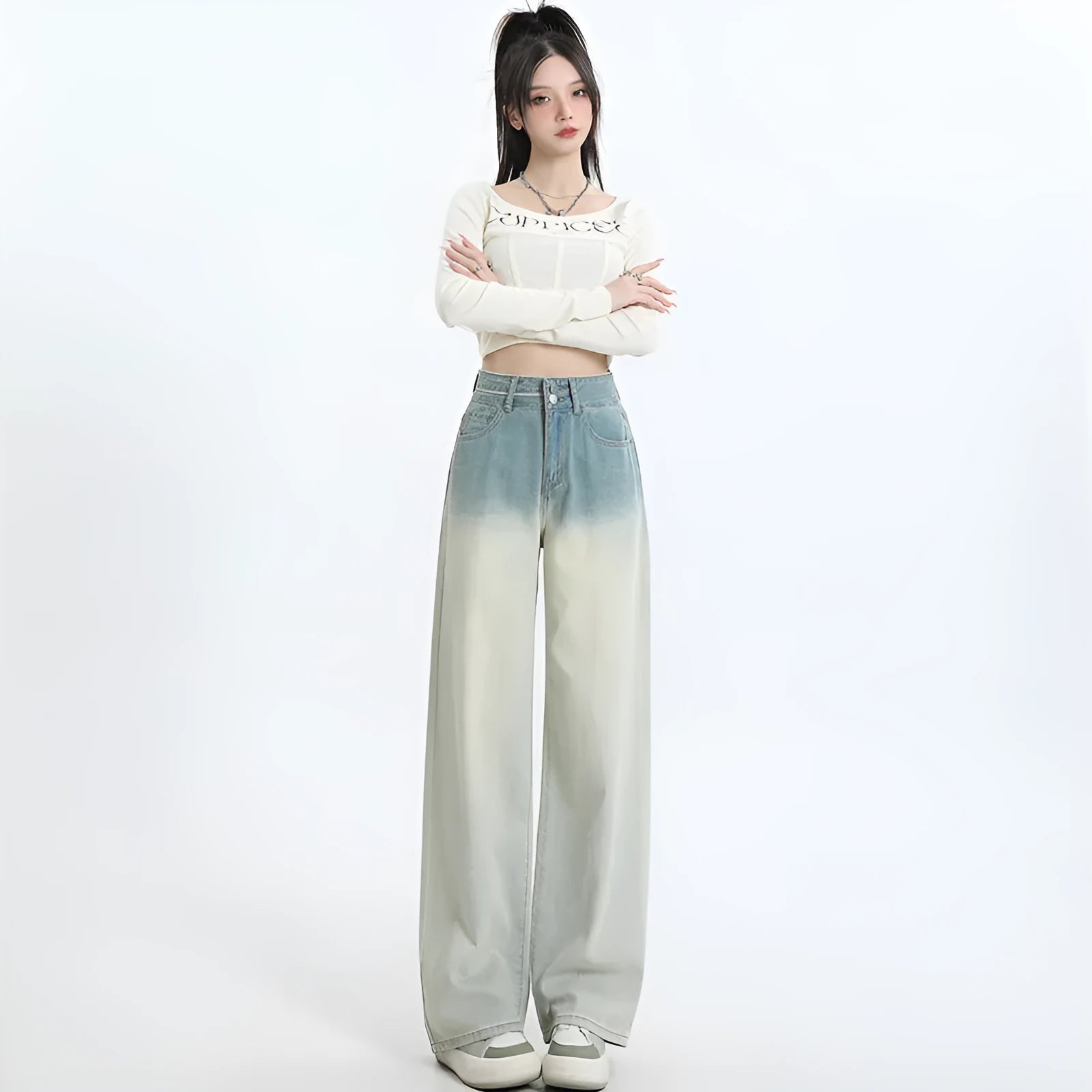 Women's gradient blue straight-leg denim trousers with wide-leg cut on hanger