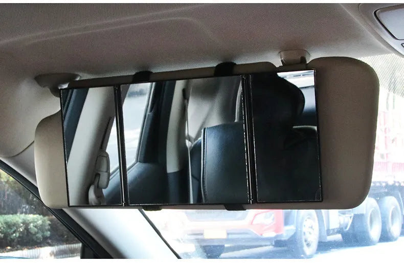 Silver car folding makeup mirror shown both closed at 15.5cm and open at 30.5cm width