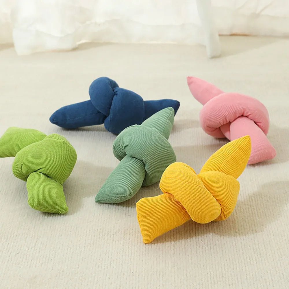 White cotton dog rope chew toy with multiple knots for tug play and dental flossing