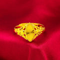 Gold-coloured geometric brass ring with textured design elements for women
