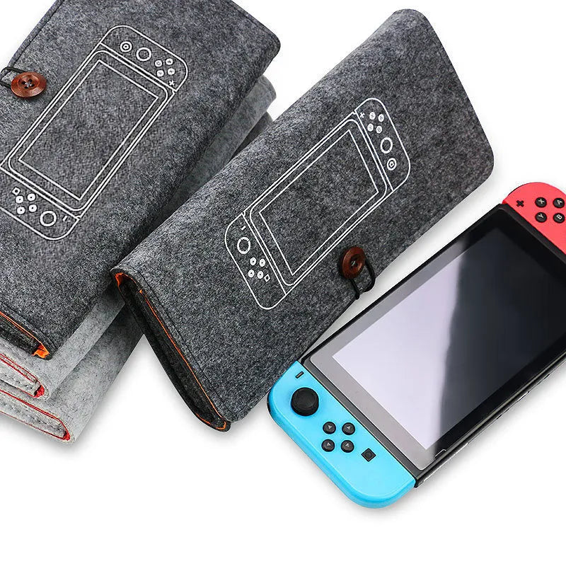 Black felt Nintendo Switch carrying pouch with game card slots and double compartments.