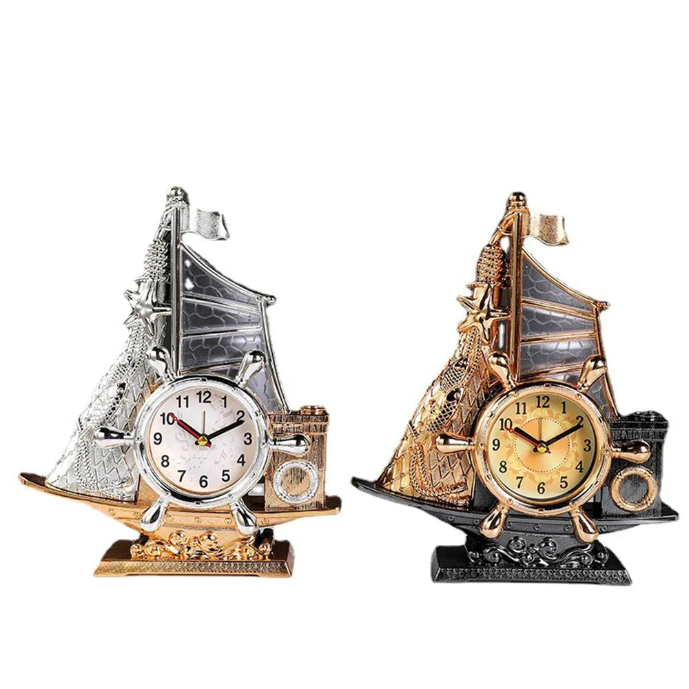 Gold or silver bedroom alarm clock with plastic construction on bedside table