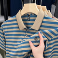 Men's striped casual short sleeve T-shirt in polyester showing mosaic pattern detail.