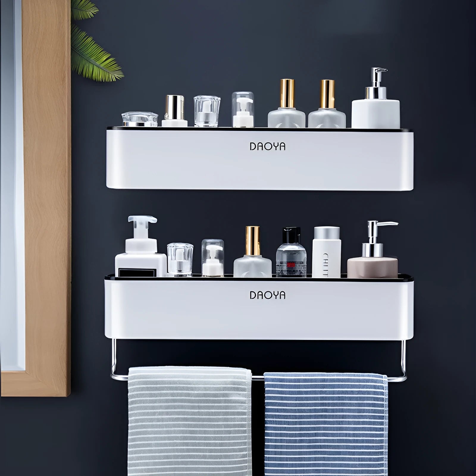 Black wall-mounted bathroom shelf with hole-free installation holding shampoo and shower gel bottles