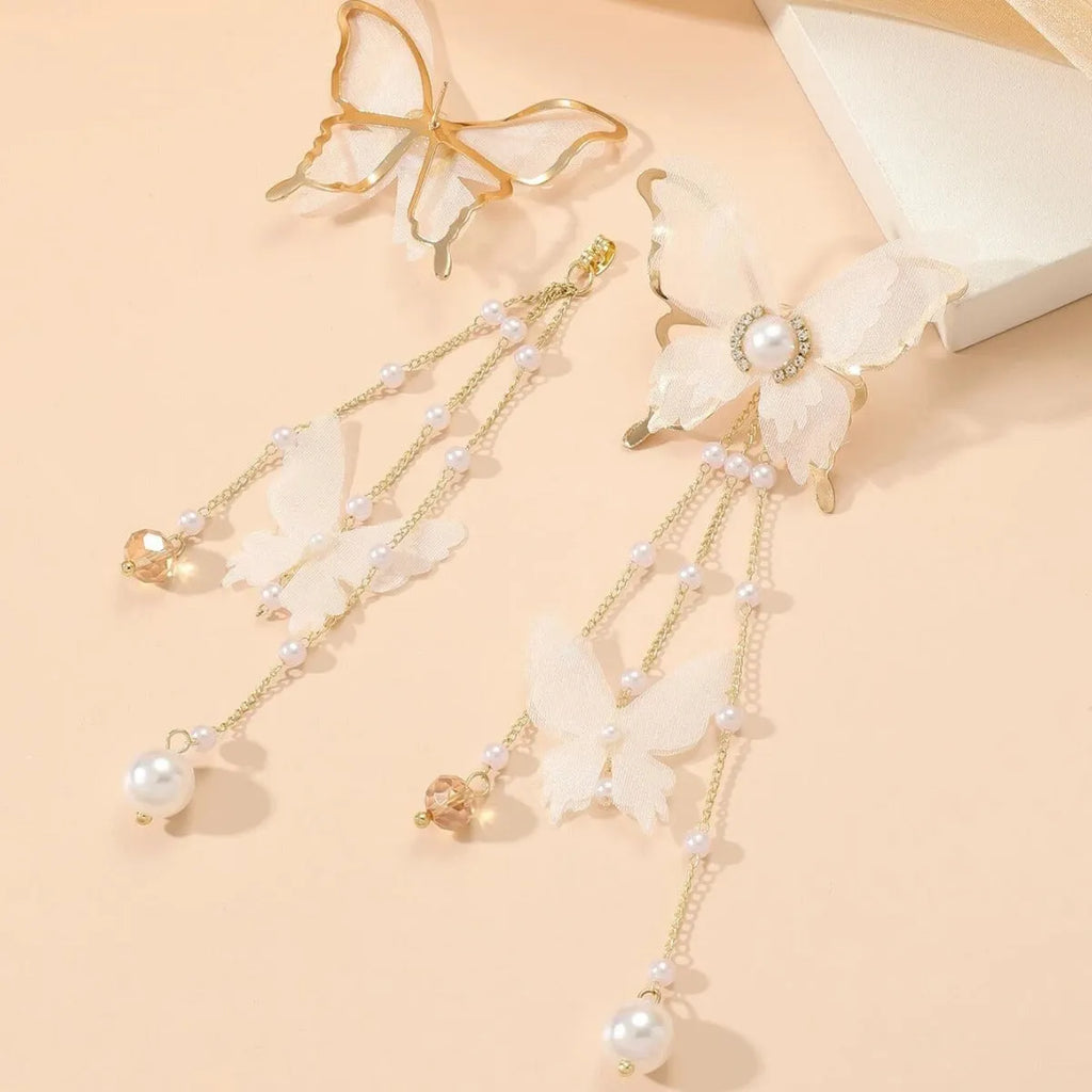 White butterfly earrings with tassel lace and pearl rhinestone decorative details