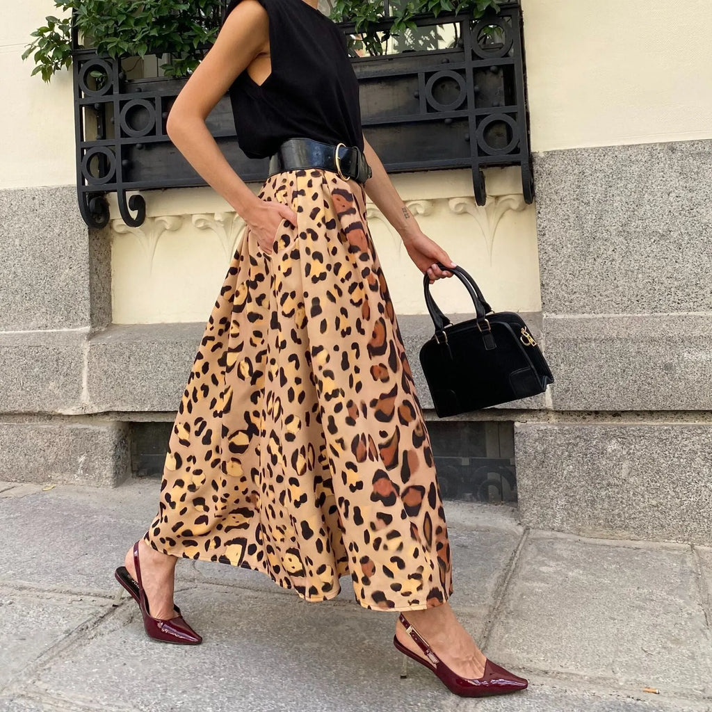 Brown leopard print women's A-line skirt with a long length and big flowing hem.