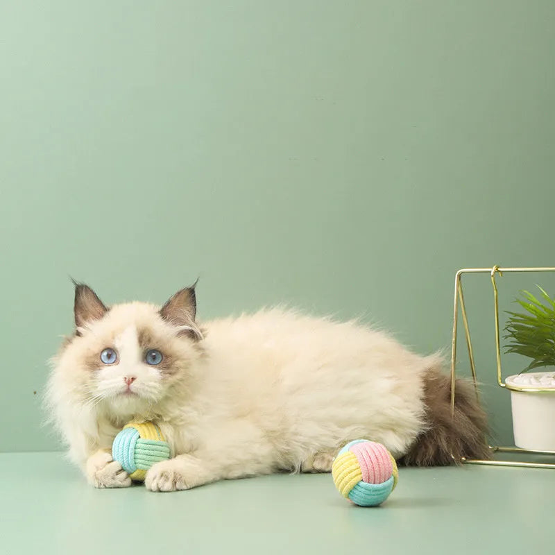 Handmade blue powder, green blue, and pink green cotton plush cat hair ball toy, 5cm diameter.