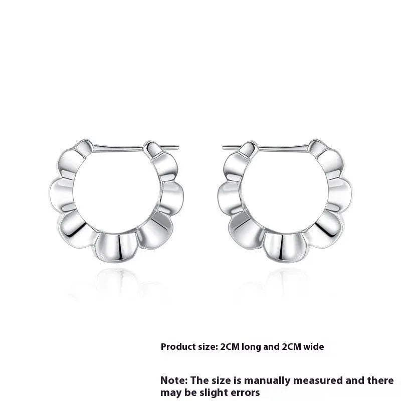 Geometric sterling silver earrings with round elements and retro styling