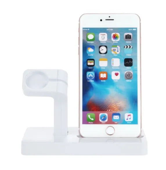 White 2-in-1 charging dock holding an iPhone and an Apple Watch upright on a desk.