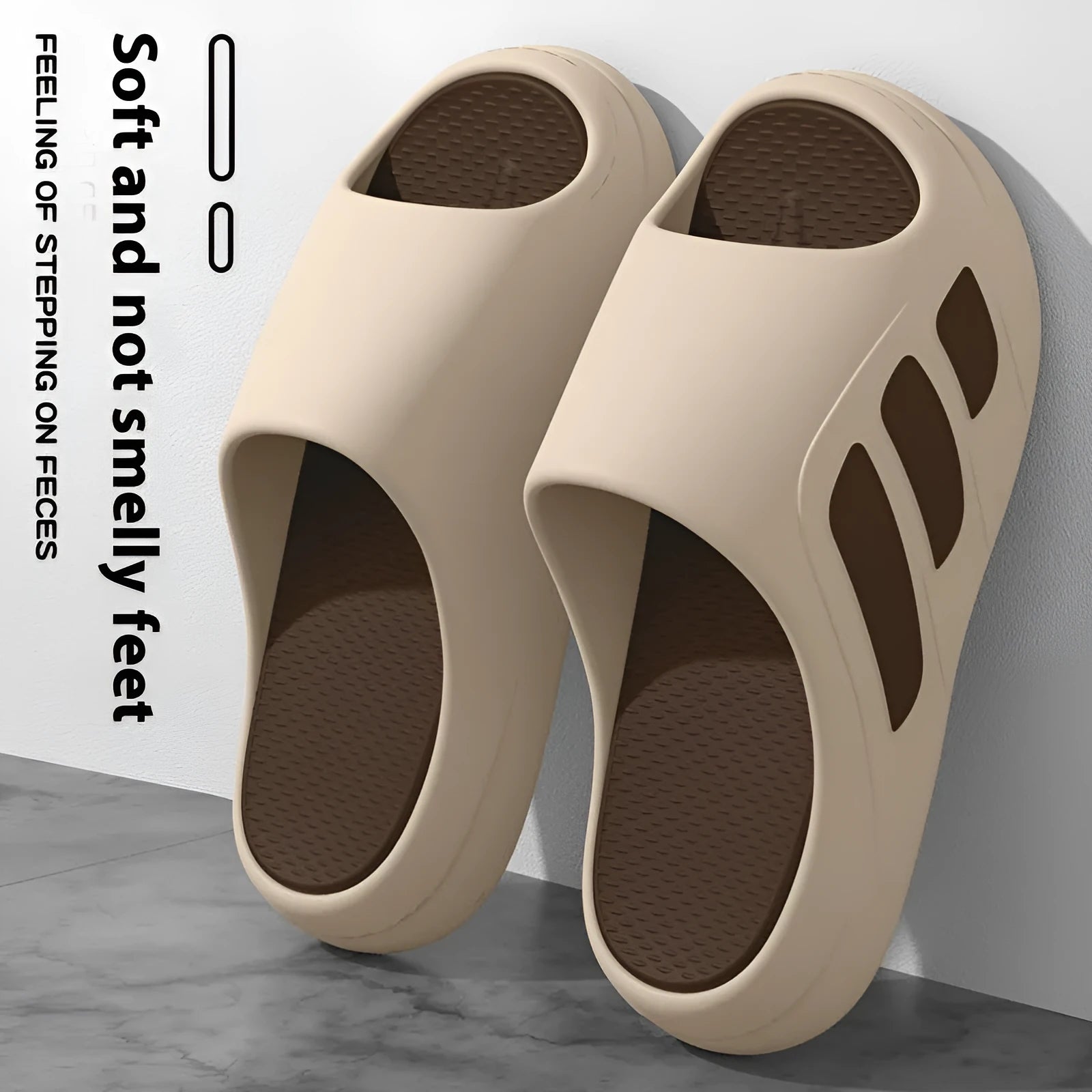 Pair of EVA platform slippers in a two-tone colour scheme, showing flip-flop style with letter detailing.