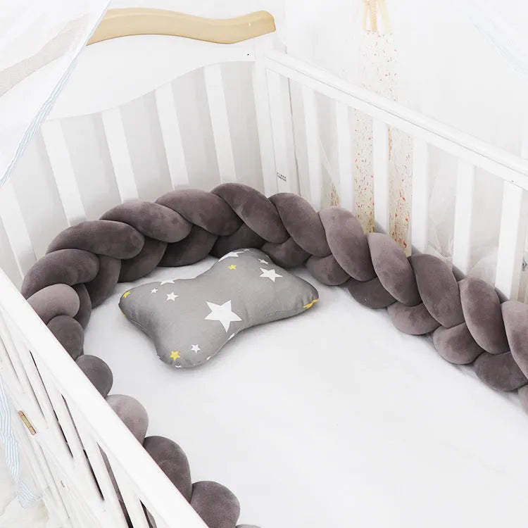Braided knot cot bumper cushion in spandex velvet for crib safety protection.