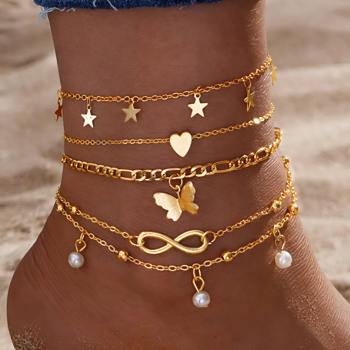 Four-piece butterfly pearl heart anklet set with layered alloy foot chains