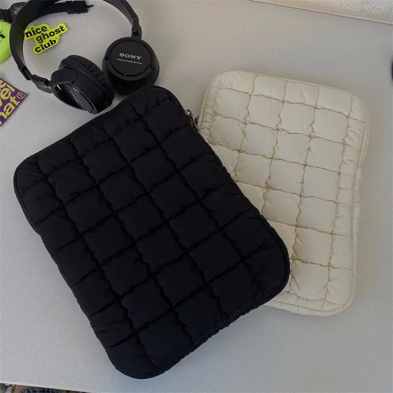 Large black nylon laptop bag with cloud cotton interior, shown open to reveal storage compartments.