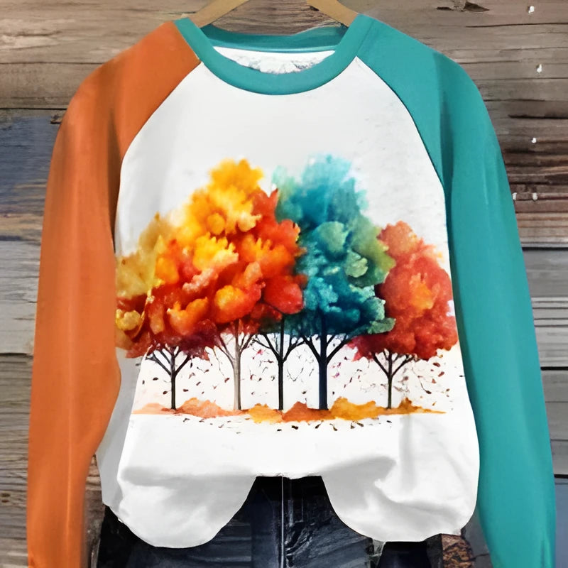 Green women's hoodie with a large 3D cartoon character print on the front.