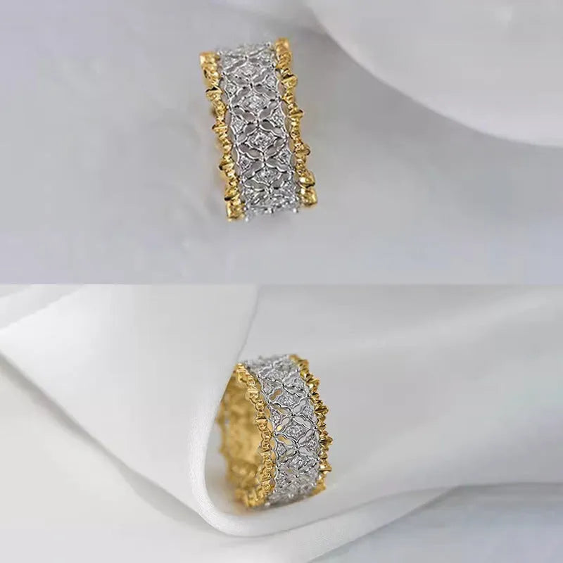 Geometric two-tone zircon ring with round elements on a copper base, shown in gold.