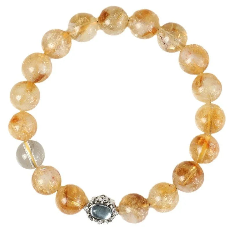 Citrine crystal bracelet with 10mm geometric faceted beads on wrist