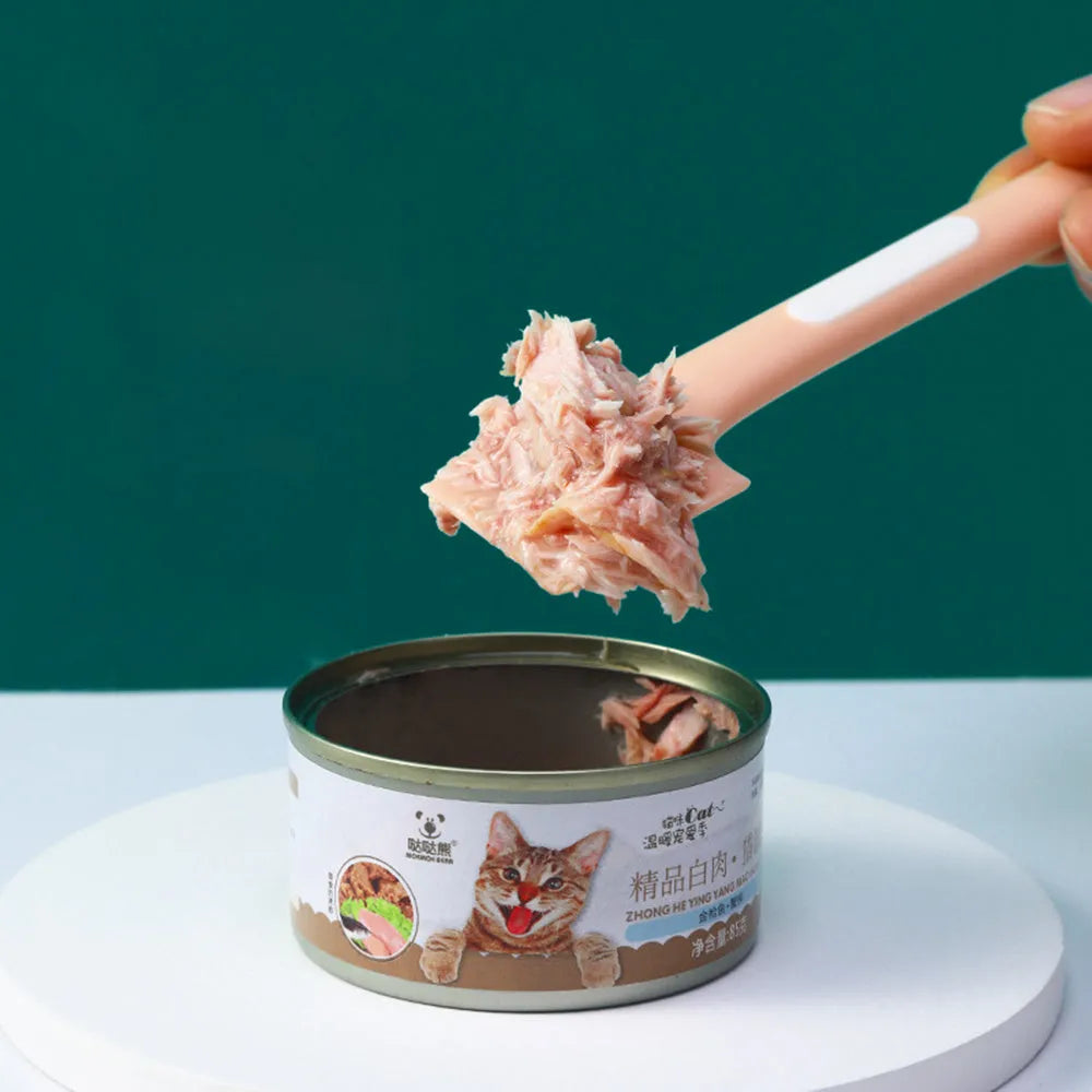 Long-handled TPR pet food spoon in green colour with right-angle scraper design for canned food