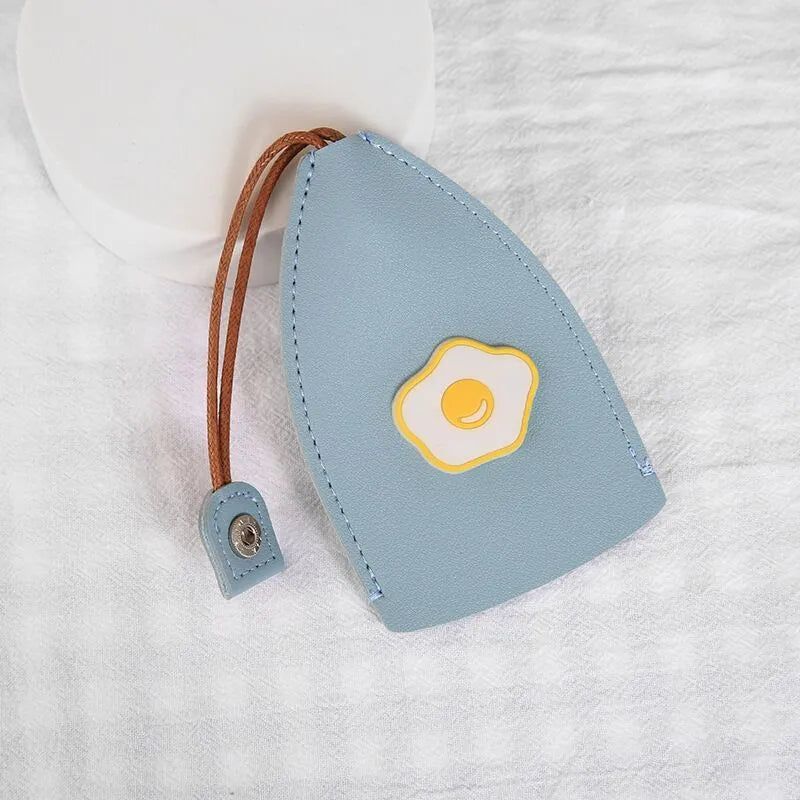 Colourful cartoon pull-out key case made from PU leather showing design options