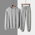 Men's light grey cashmere hooded knit sweatshirt and matching trousers casual winter set.