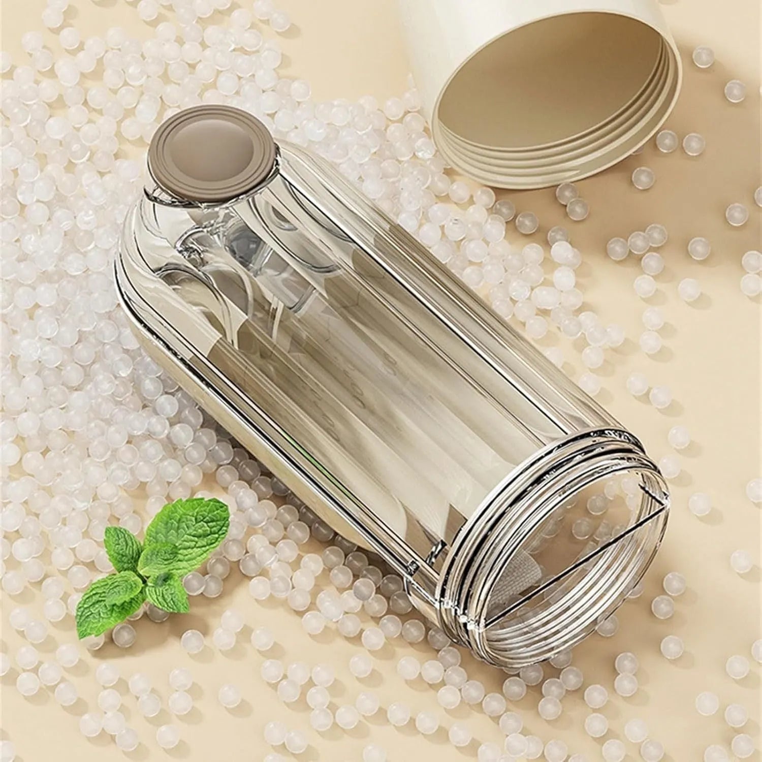 Beige foldable dog water bottle with drinking tray and base food container, shown open and closed