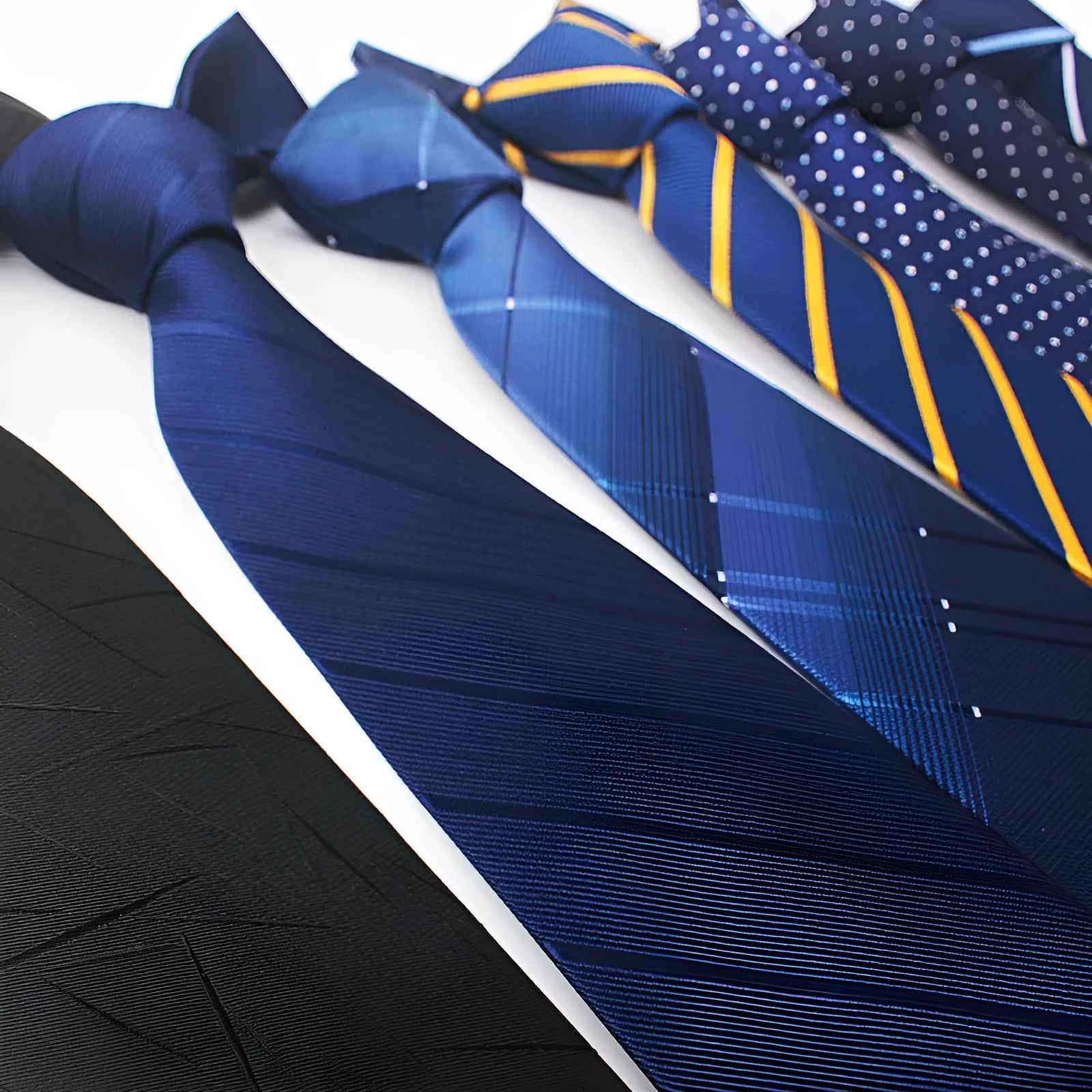 Men's red and black striped polyester jacquard tie with arrow style tip on a white background.