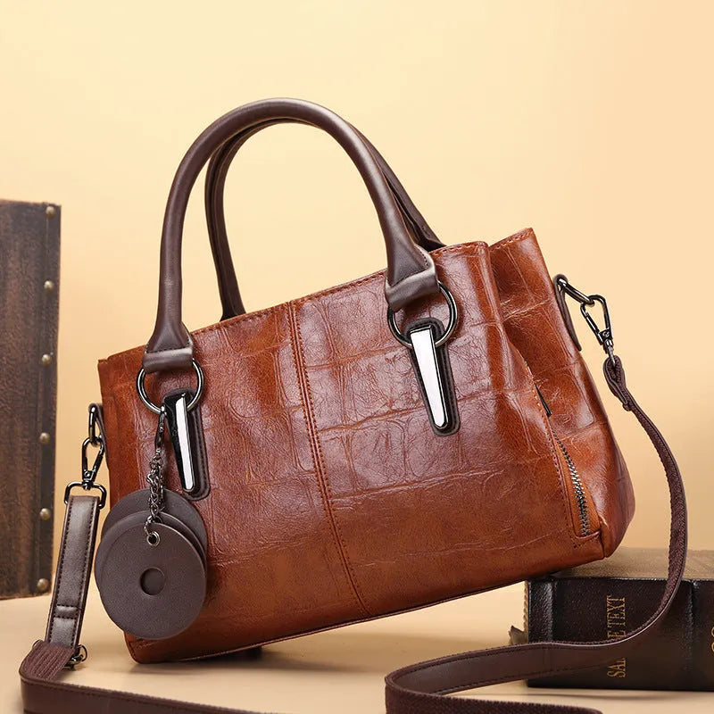 Horizontal square PU shoulder bag with open pocket and contrast stitching in black or brown colour options