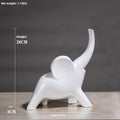 Rose gold and white resin elephant ornaments in large and small sizes displayed singly and as pairs