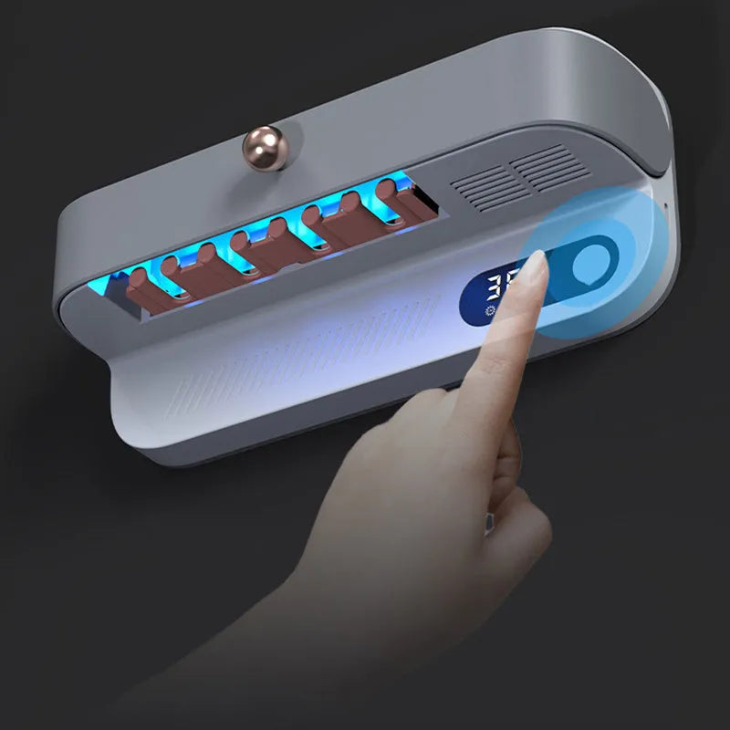 White wall-mounted smart toothbrush steriliser with USB charging port and button control