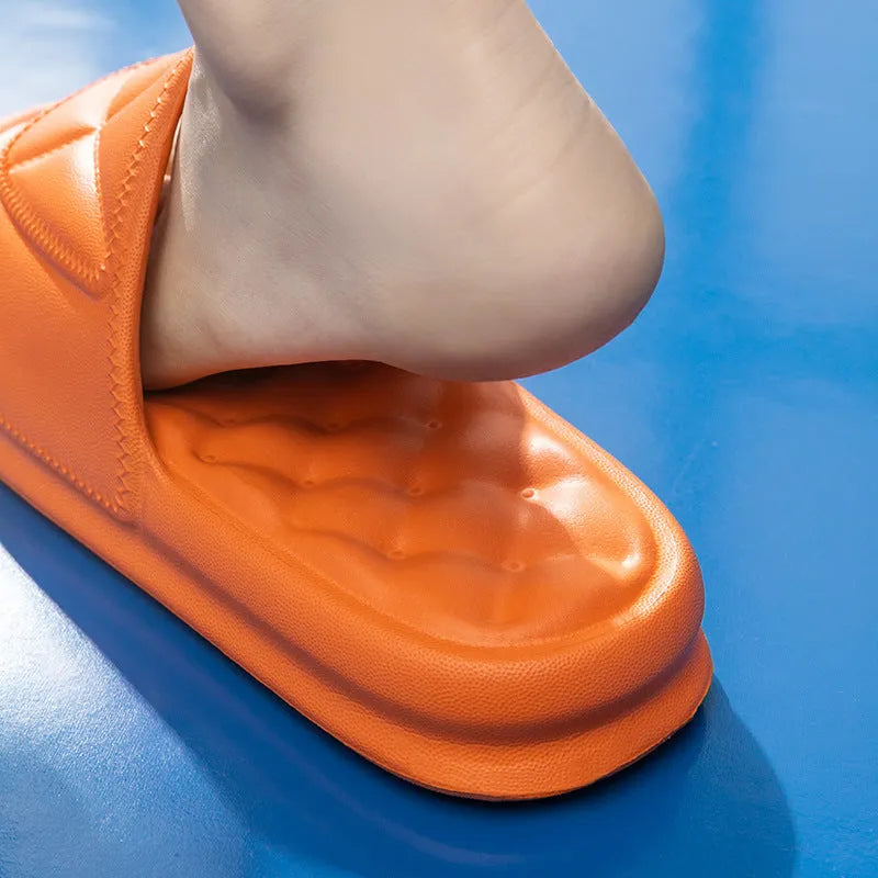 A pair of thick-soled EVA bathroom slippers in a chosen colour, showing the non-slip sole pattern.