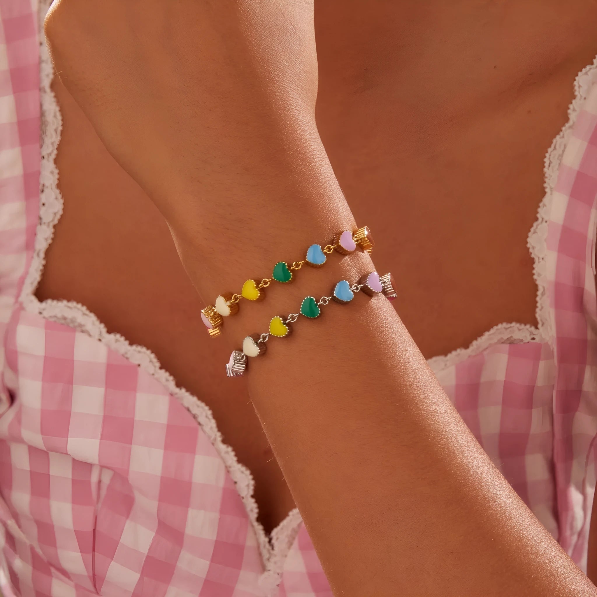 Women's titanium steel bracelet with love heart pendant in gold or steel electroplated finish