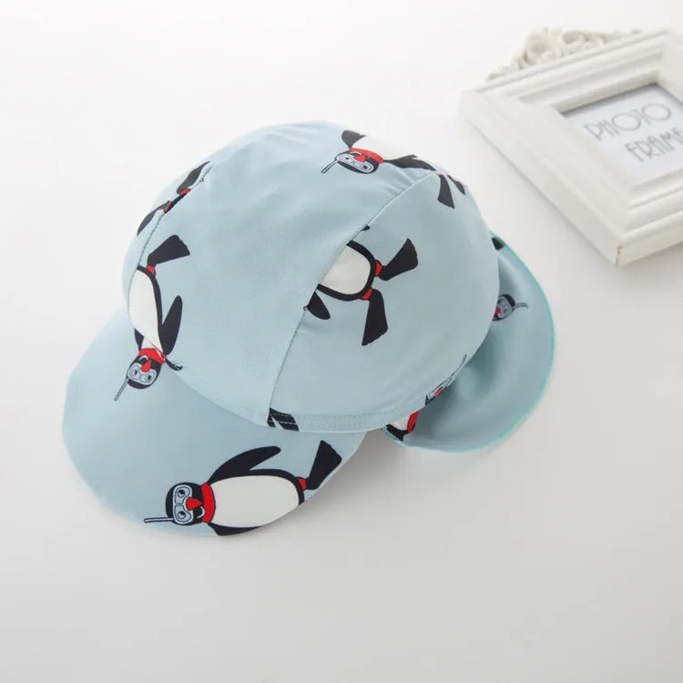 Boys' penguin print long sleeve one-piece swimsuit with matching swimming cap set