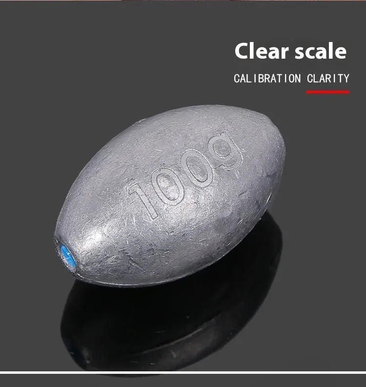 Olive rugby-shaped fishing sinker with scaled texture and plastic core in various weights from 10g to 150g