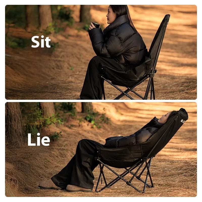 Night Black Oxford cloth camping recliner folding moon chair in outdoor setting