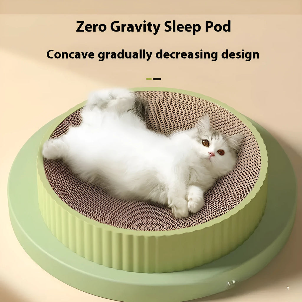 Green round corrugated cardboard cat scratching board measuring 55cm with two replacement pads.