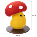 Foldable mushroom-shaped cardboard cat scratcher with accordion design on a floor