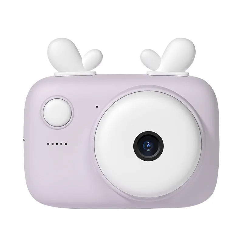 A2 Kids Macaron digital camera in green, showing front and rear lenses and 2.4-inch screen, with lanyard attached.