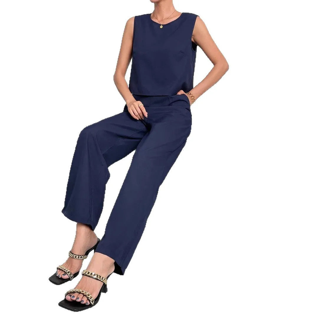 Women's red polyester lounge set featuring sleeveless round neck top and wide leg pants