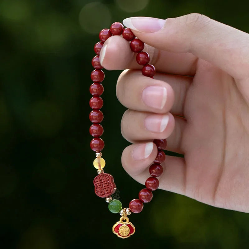 Emperor Sandstone cinnabar bracelet with fu character charm in 6mm and 8mm bead sizes