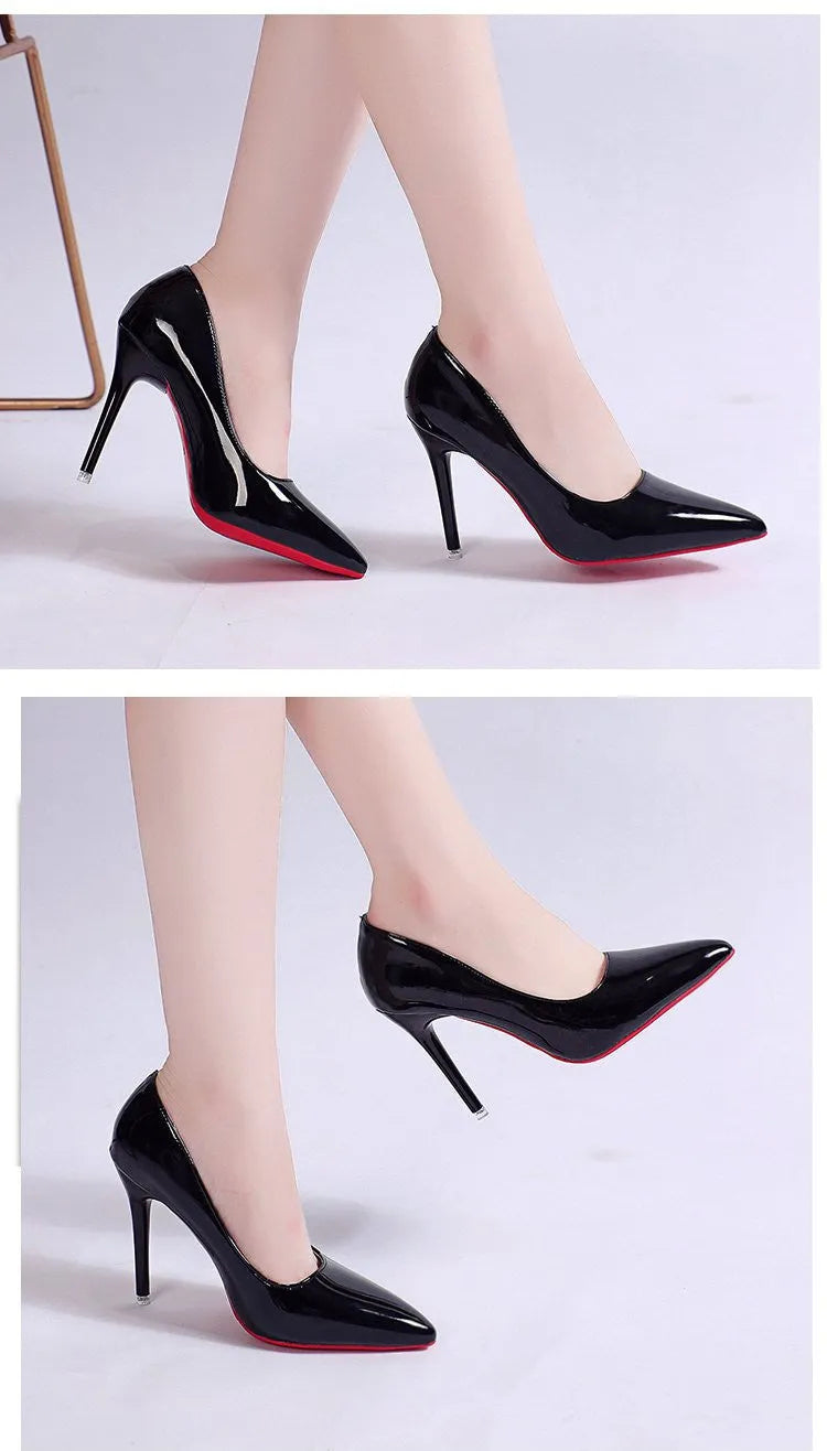 Women's black stiletto heel pointed toe pumps with a shallow mouth on a white background.