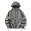 Thin loose-fit nylon outdoor sports jacket shown in available colours on a neutral background.
