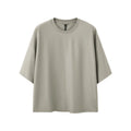 Men's loose fit short sleeve t-shirt in cotton-polyester blend available in black and sand grey colours